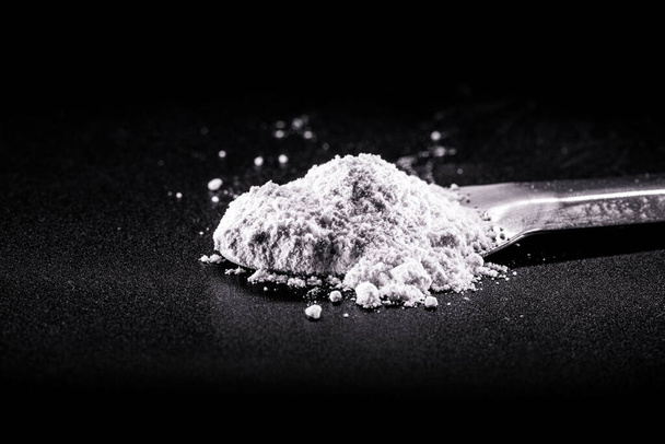 Phosphate, pile of phosphorous powder, used as a fertilizer or compost, for soil correction, or phosphating. Isolated background with copyspace - Foto, Imagem