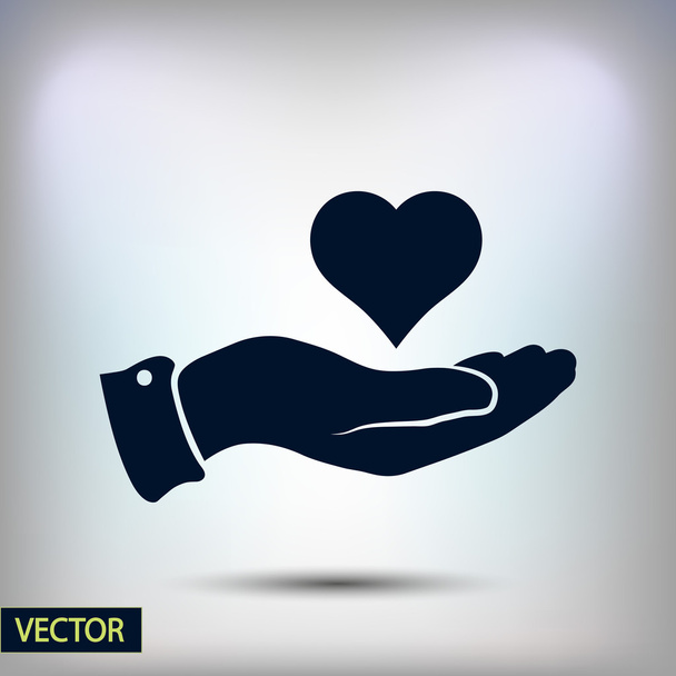 Heart in hand icon - Vettoriali, immagini