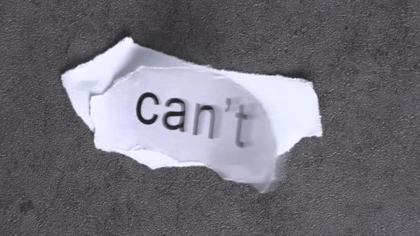 Replace the word CAN'T with the word CAN. Business concept with letters and wobbly paper. - Metraje, vídeo