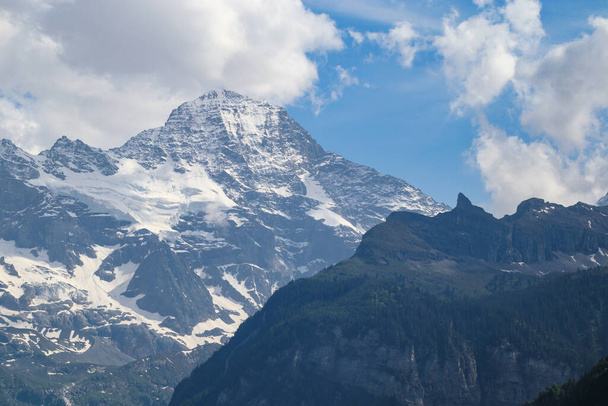view of Alps mountain in Switzerland, glacier peak, mountain covered by snow - Foto, Imagen