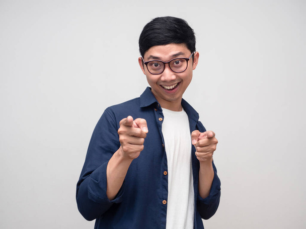 Cheerful man glasses gesture funny double point finger isolated - Photo, image