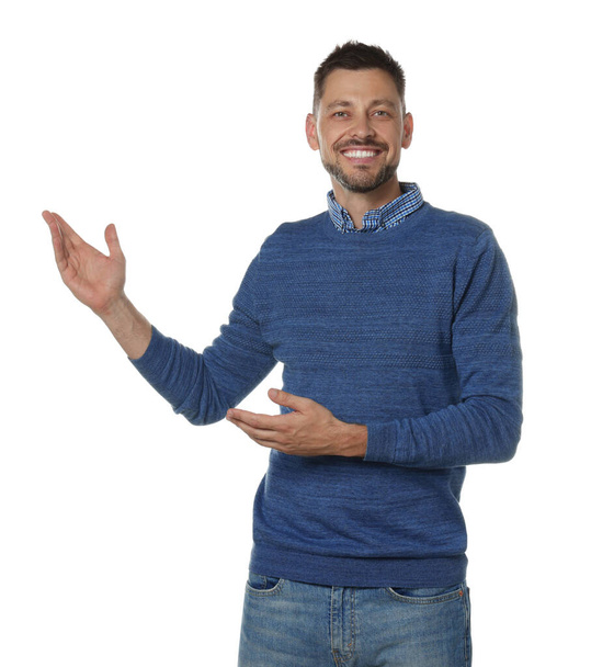Handsome man gesturing on white background. Weather forecast reporter - Foto, immagini