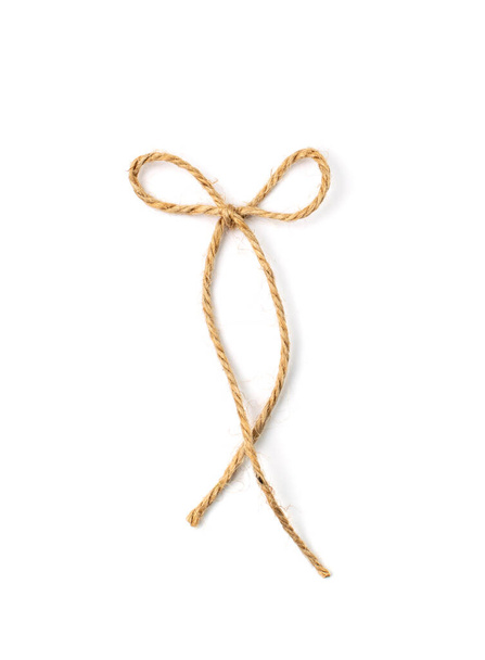 Стрічковий лук ізольовано. банти з джутової мотузки, пакувальні шнурові вузли, в'язаний сільський подарунок, екологічно чистий природний бантик з мотузки
 - Фото, зображення