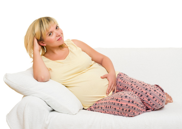 pregnant woman on sofa  - Photo, image