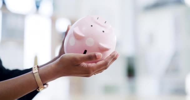 Empty piggy bank in hand due to inflation, poor economy and debt insurance with bokeh or on business background. Poverty, bankruptcy and woman entrepreneur struggling with financial loan or budget. - Footage, Video