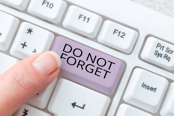 Text sign showing Do Not Forget, Business idea Have always in mind Remember important things Good memory Businesswoman Holding Speech Bubble With Important Messages. - Photo, Image