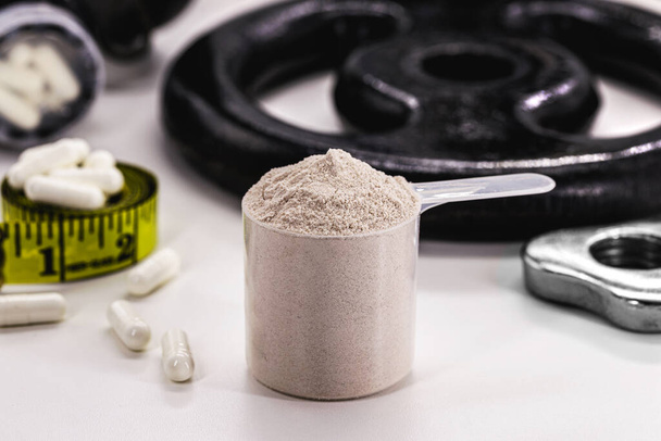 Creatine is an amino acid compound present in muscle fibers and the brain, used by athletes, food supplement for athletes - 写真・画像