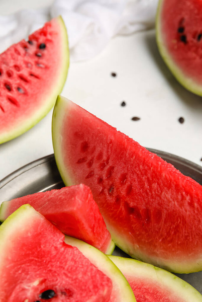 Plate with slices of watermelon on white background, closeup - Φωτογραφία, εικόνα