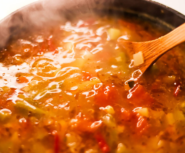 Cooking vegetable soup in saucepan, comfort food and homemade meal concept - Fotoğraf, Görsel
