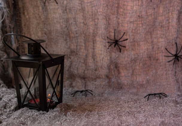 gray background with spiders and lantern for halloween holiday - Fotoğraf, Görsel