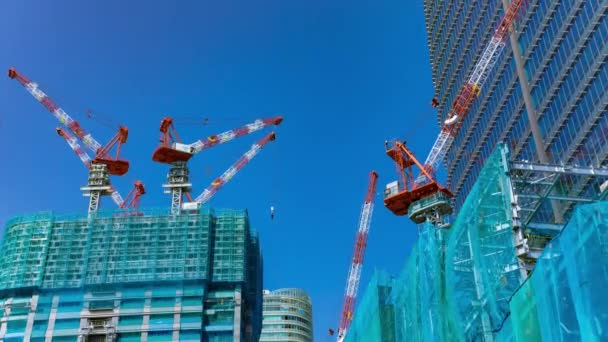 A timelapse of crane at the under construction in Tokyo. High quality 4k footage. Minato district Iikurakatamachi Tokyo Japan 08.09.2022 It is center of the city in Tokyo. - Footage, Video