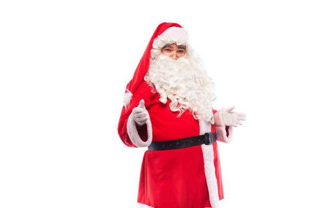 Санта-Клаус в очках на белом фоне, с копировальным пространством
 - Фото, изображение