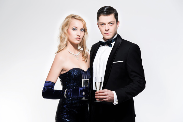 Romantic new year's eve fashion couple toasting with champagne.  - Valokuva, kuva
