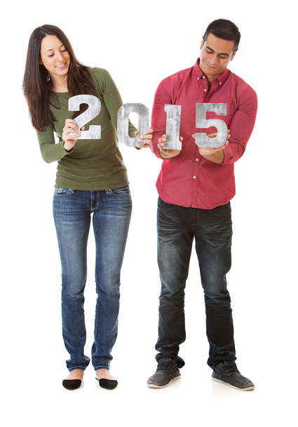 NYE: Young Couple Holding Numbers For New Year 2015 - Foto, afbeelding