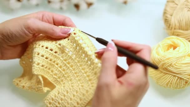 Womens hands knit with knitting needles from woolen, cotton threads. Hobbies and needlework from handmade yarn. - Footage, Video