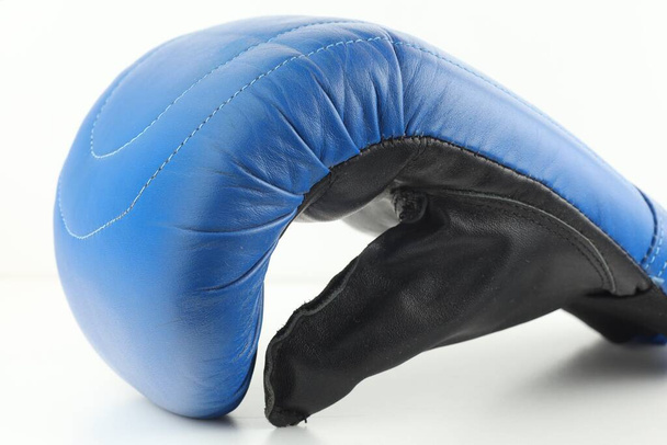 Blue boxing glove close-up. - Zdjęcie, obraz