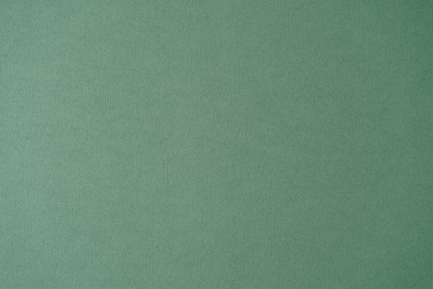 Green color paper background. Abstract background modern hipster futuristic. Texture design - Photo, image