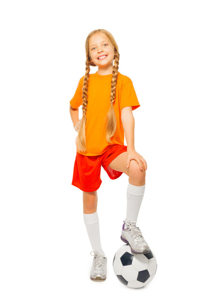 Girl stands on soccer ball - Φωτογραφία, εικόνα