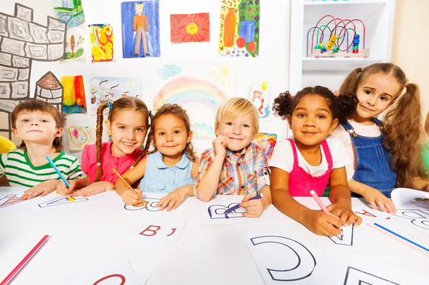 Kids drawing and filling letters - Foto, Imagen