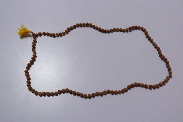 Japa mala or Prayer beads made from the seeds of the rudraksha tree - Photo, image