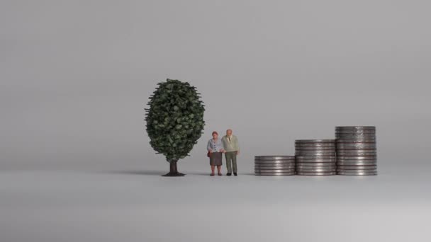 Miniature people and the concept of an aging society. - Footage, Video