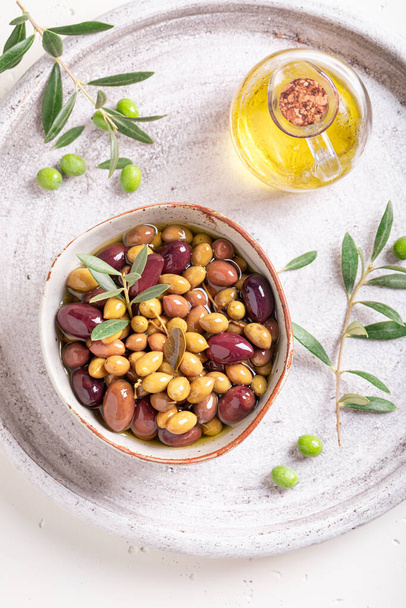 Green and black olives as a source of healthy fat. Products made of olives. - Fotoğraf, Görsel