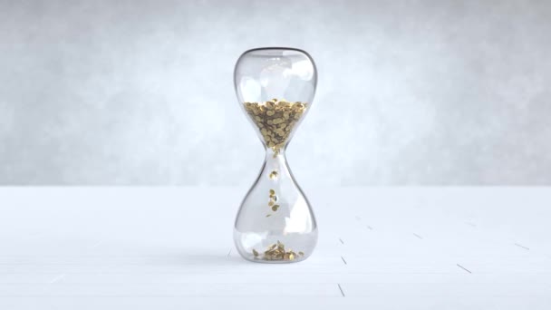 Las monedas de oro cayendo en el reloj de arena, el tiempo es el concepto de dinero - Imágenes, Vídeo