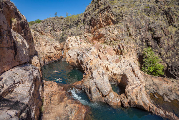 Rock pool at the Barramundi falls, Kakadu National Park, Northern Territory, Australia, one of the crocodile fre lakes in this area, where swimming is possible - Fotoğraf, Görsel