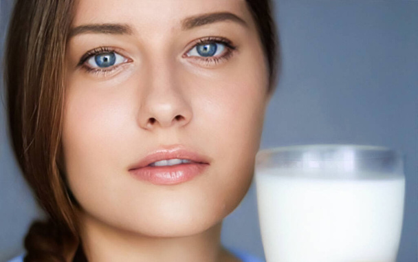 Happy young woman with glass of milk or protein milk shake, healthy cocktail drink for diet and wellness concept - Zdjęcie, obraz