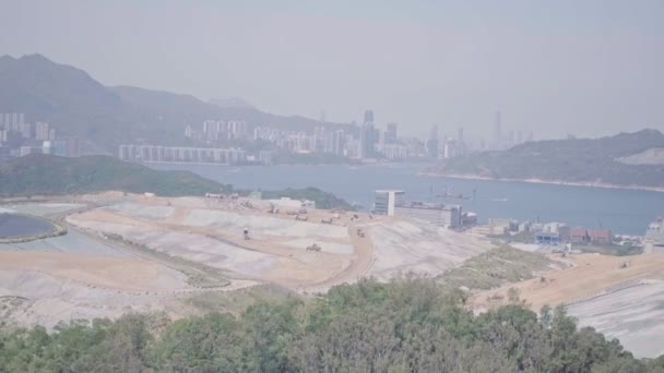 Landfill, an environmental issue causing climate change, seen in Hong Kong. Aerial drone view - Πλάνα, βίντεο