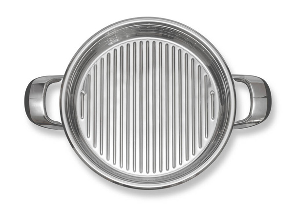 An empty steel grill pan, highlighted on a white background with a cut-out track. View from above. - Fotoğraf, Görsel