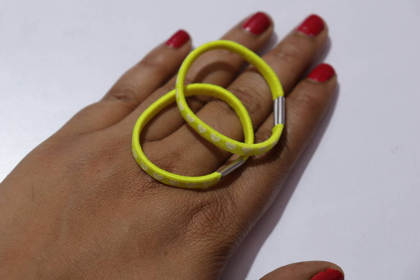 Yellow Color rubber bands on a white background - Valokuva, kuva