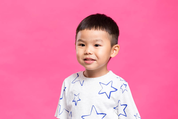 Little kid over pink background - Foto, immagini