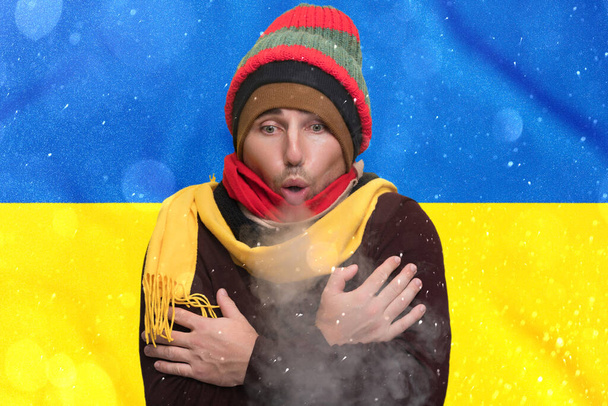 Cold winter and consequences of gas sanctions, consequences of the war in Ukraine, shortage of gas and heat in Ukraine, a European freezes from the cold and warms himself with steam from his mouth. - Photo, image