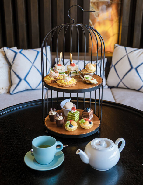 Luxury high tea with snacks and tea in a luxury hotel - Photo, image
