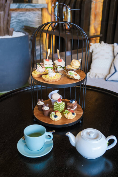 Luxury high tea with snacks and tea in a luxury hotel - Foto, Imagem