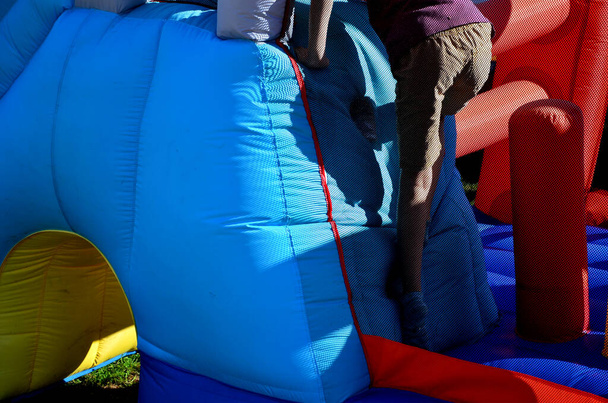 before inflating the bouncy castle attraction make sure blower is securely connectedelectricity and slide is anchored to the ground. otherwise there is a risk of electric shock or falling down, safety - Fotó, kép