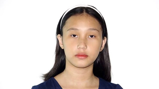 An Unemotional Filipina Female Youngster Isolated - Fotoğraf, Görsel