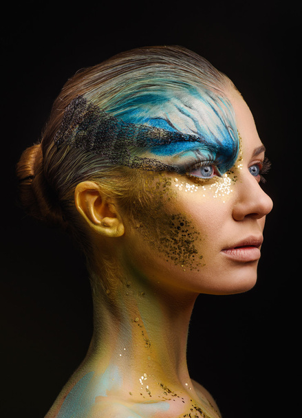 Young woman with fantasy make up - Фото, изображение