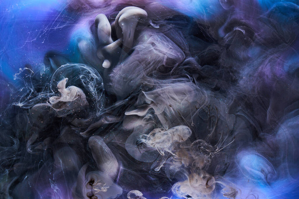 Blue black multicolored smoke abstract background, acrylic paint underwater explosion - Fotó, kép