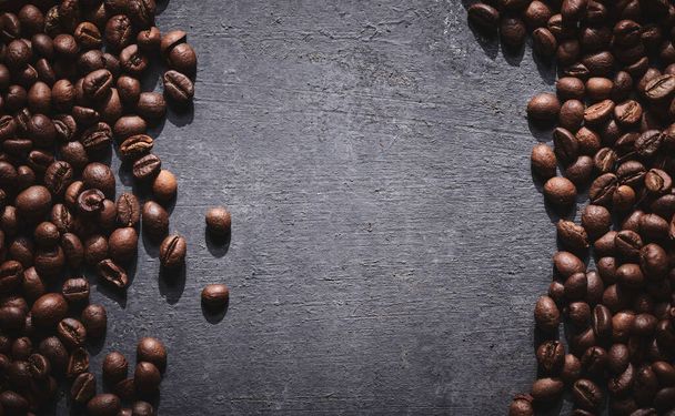 Roasted coffee beans on gray background - Photo, Image