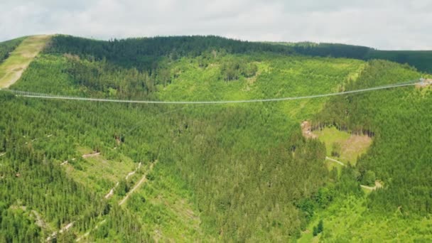 Aerial view of suspension Sky Bridge 721 in mountains, Dolni Morava, Czech Republic - Video