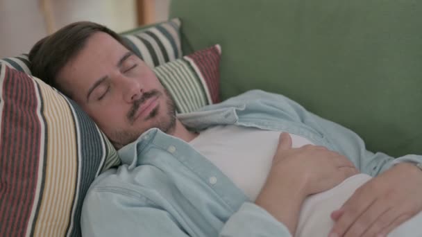 Relaxed Casual Man Sleeping in Bed Peacefully  - Filmmaterial, Video