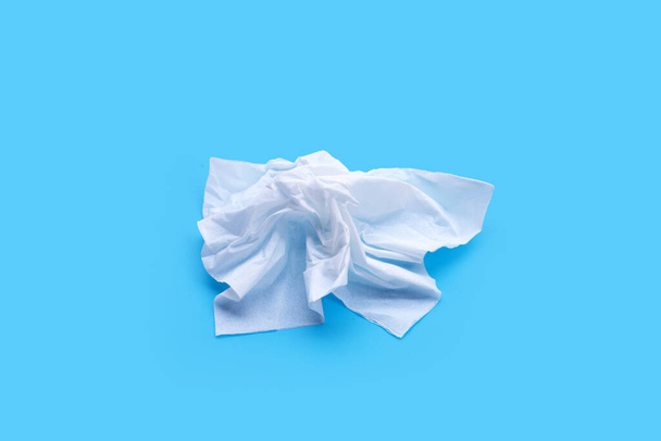 Facial tissue on blue background. - Photo, Image