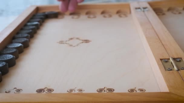 backgammon game throwing dice close-up movement of chips - Materiaali, video