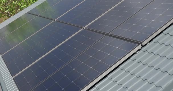 4k Tracking Shot of Solar Panels On a Residential Roof Top. - Video