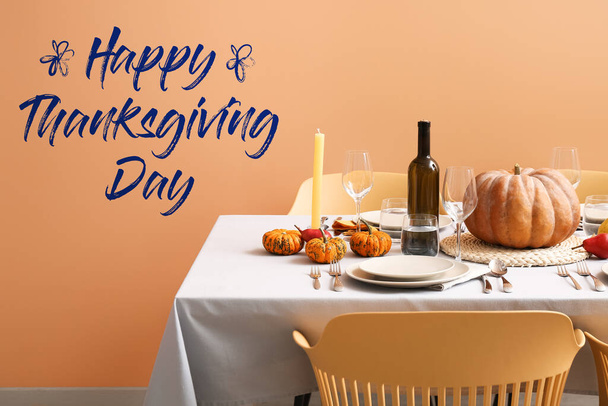 Greeting card for Happy Thanksgiving Day with beautifully served table and autumn pumpkins - Foto, afbeelding