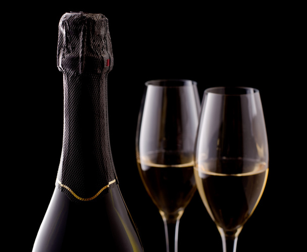Champagne bottle and two champagne glasse - Photo, Image