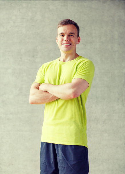 smiling man in gym - Photo, image