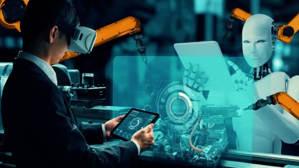 Кібернетичний промисловий робот і людський працівник працюють разом на майбутній фабриці. Концепція штучного інтелекту промислової революції та процесу автоматизації
 . - Кадри, відео